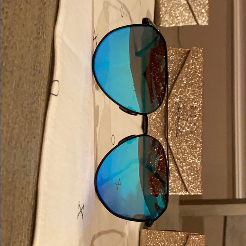 Black frame sunglasses blue tinted lenses